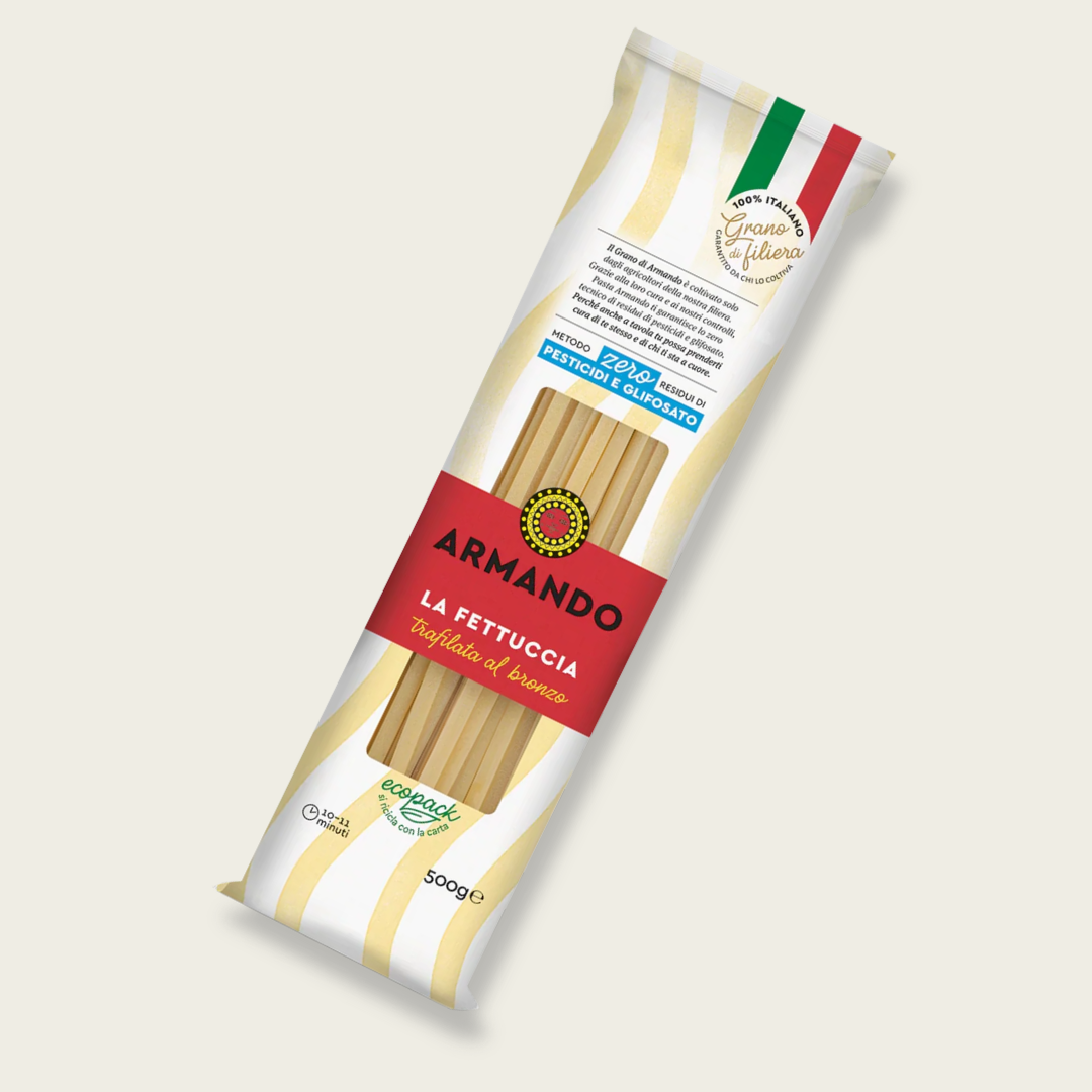 Package of Armando pasta with Italian flag design on a light beige background