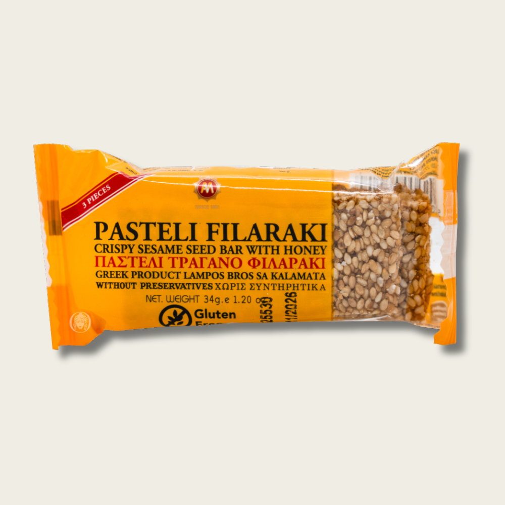 Packaged snack bar with sesame seeds and honey on a white background