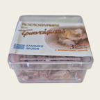 Container of dried fish with Greek flag and text on a white background