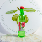 Green bottle with red cap on a marble surface, branded 'Continental Pantry'