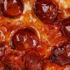 Close-up of a pepperoni pizza with melted cheese