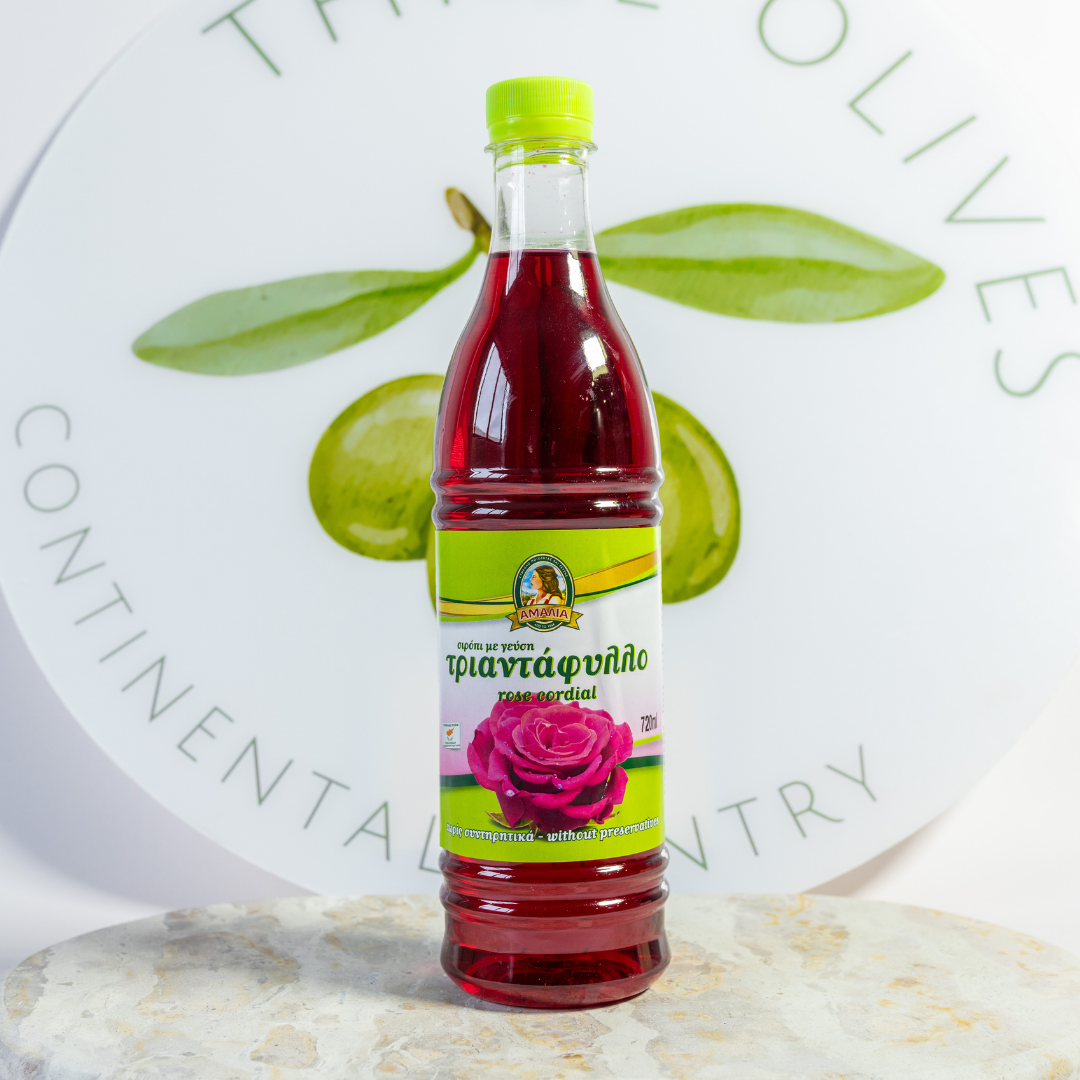 Bottle of rose syrup with a green cap on a white background with olive branch design